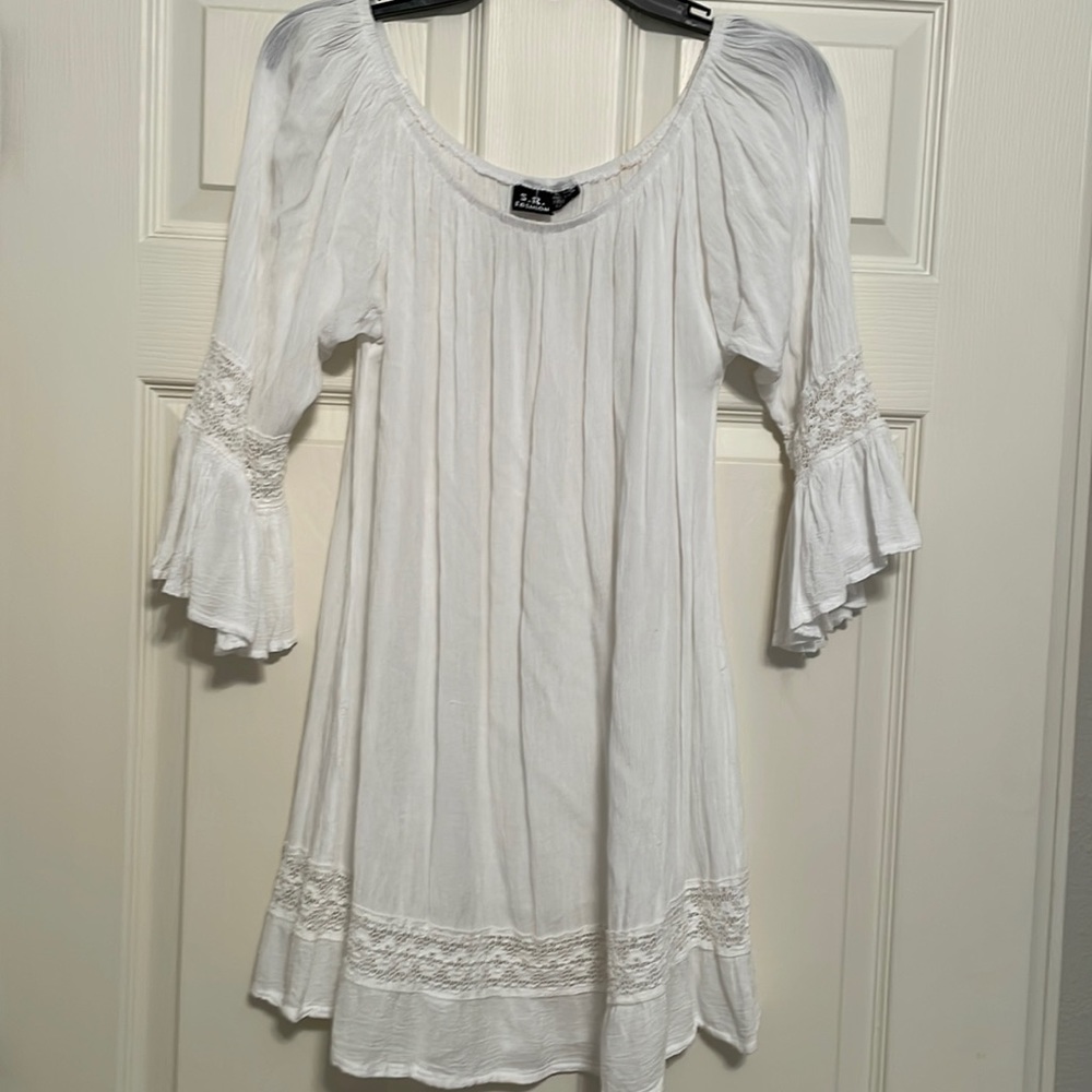 Ananda’s Collection white lace off shoulder tunic